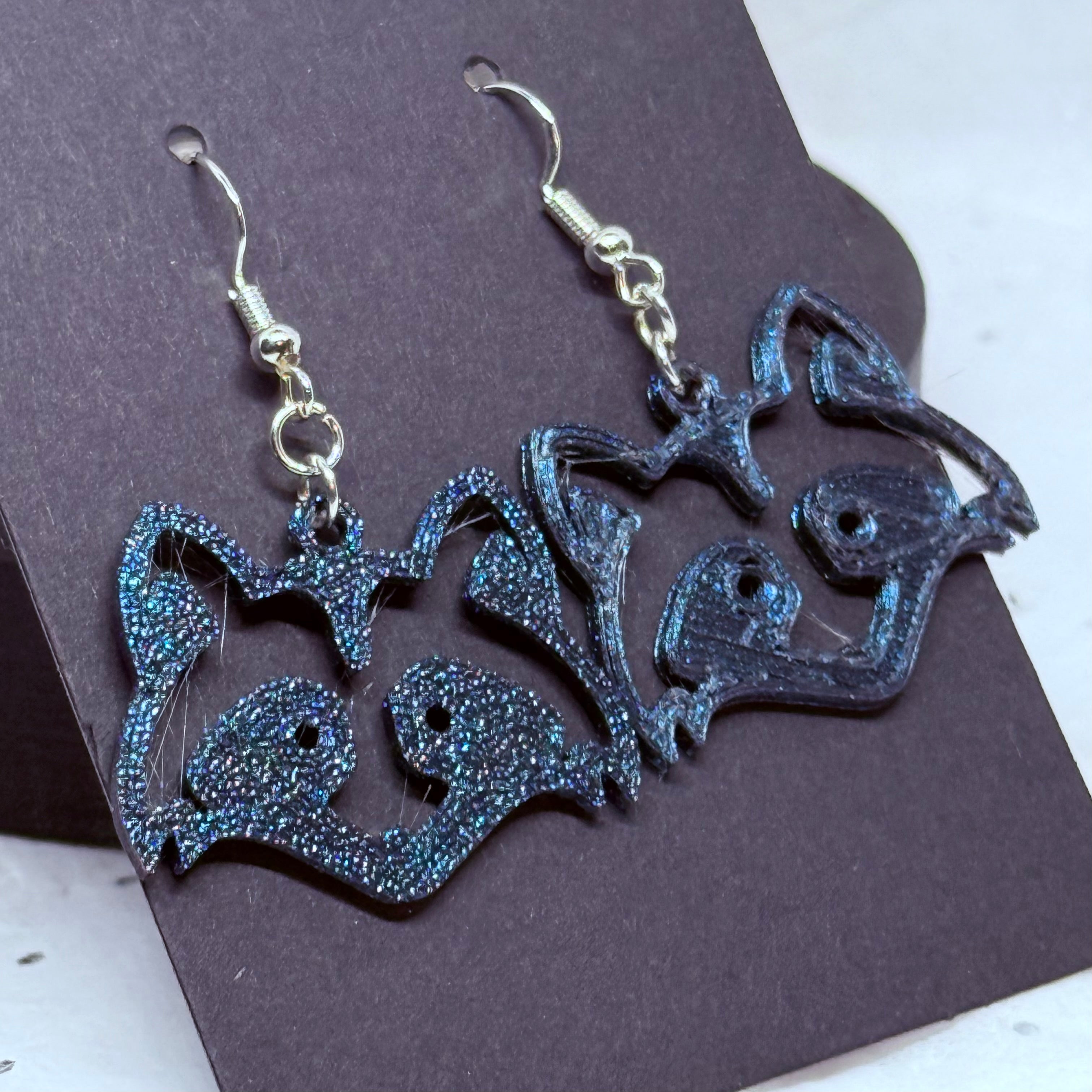 Trash Panda Earrings (Blue/Purple)