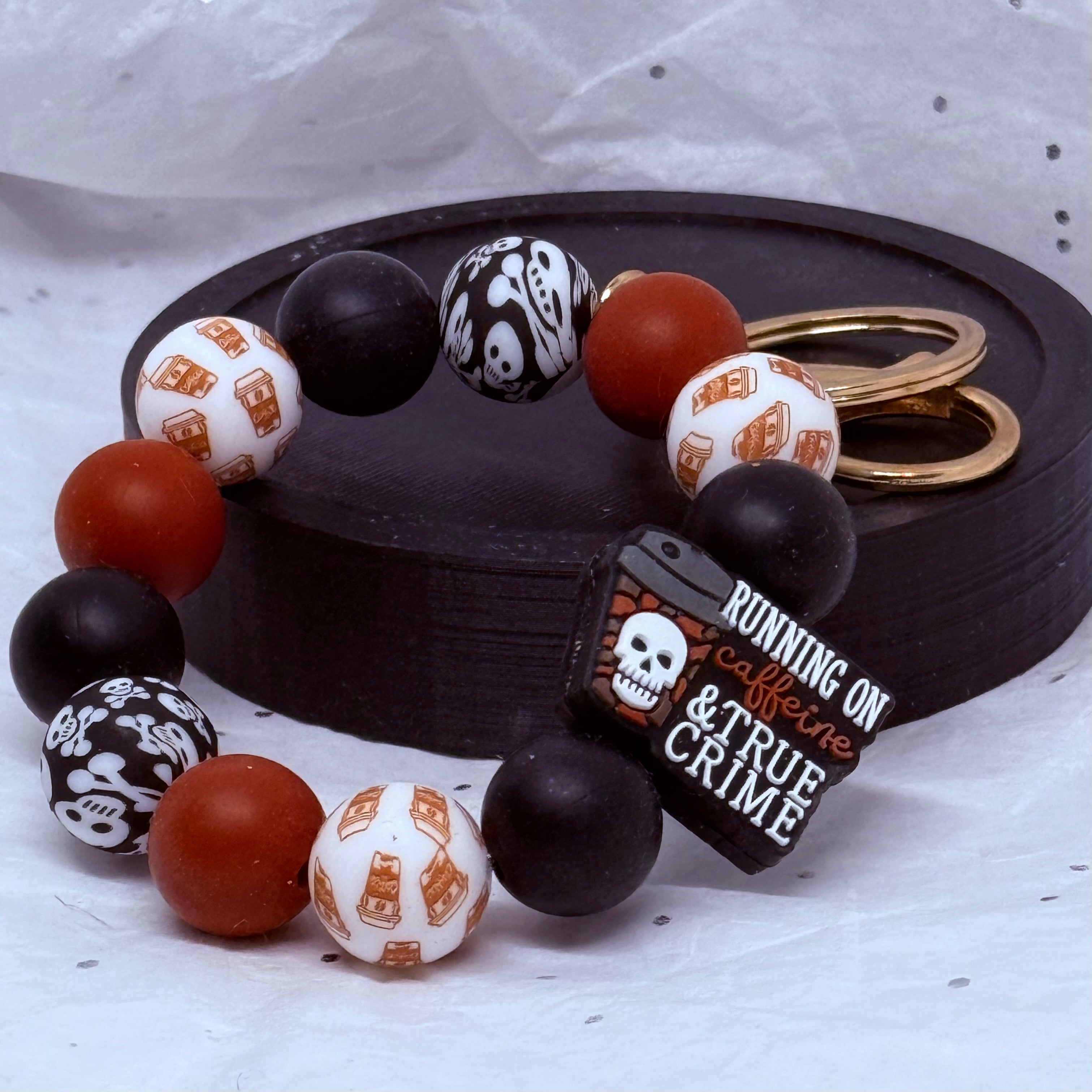 Caffeine & True Crime Beaded Wristlet